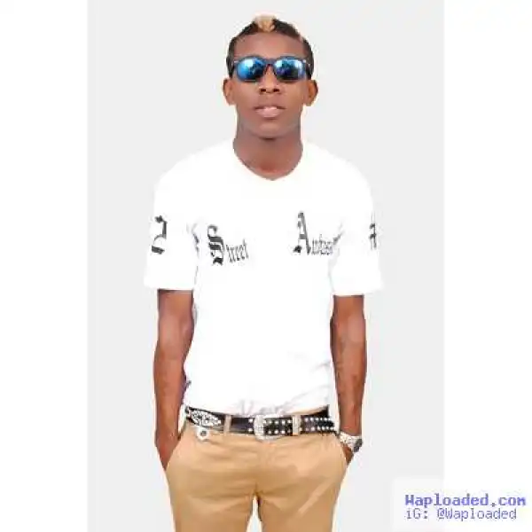 Popular Nigerian Musician Beaten and Humiliated by Fans in Agege, Lagos (Photo)